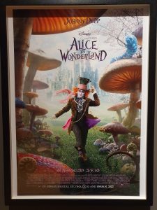 Alice: Curiouser and Curiouser exhibition poster